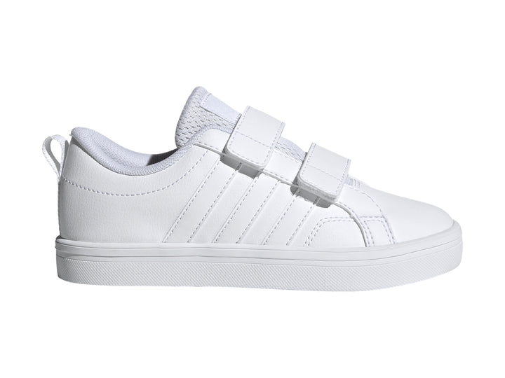 Tenis Adidas blancos de corte bajo con cierre de velcro y suela blanca.