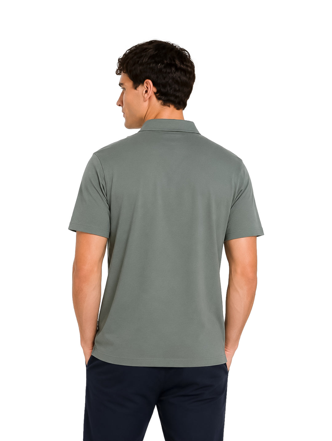 Hombre vistiendo playera polo Hurley color gris gladiador de manga corta.