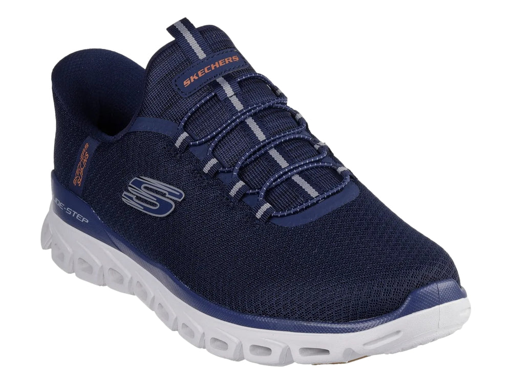 Tenis deportivos Skechers color azul marino con suela blanca gruesa y tejido transpirable.