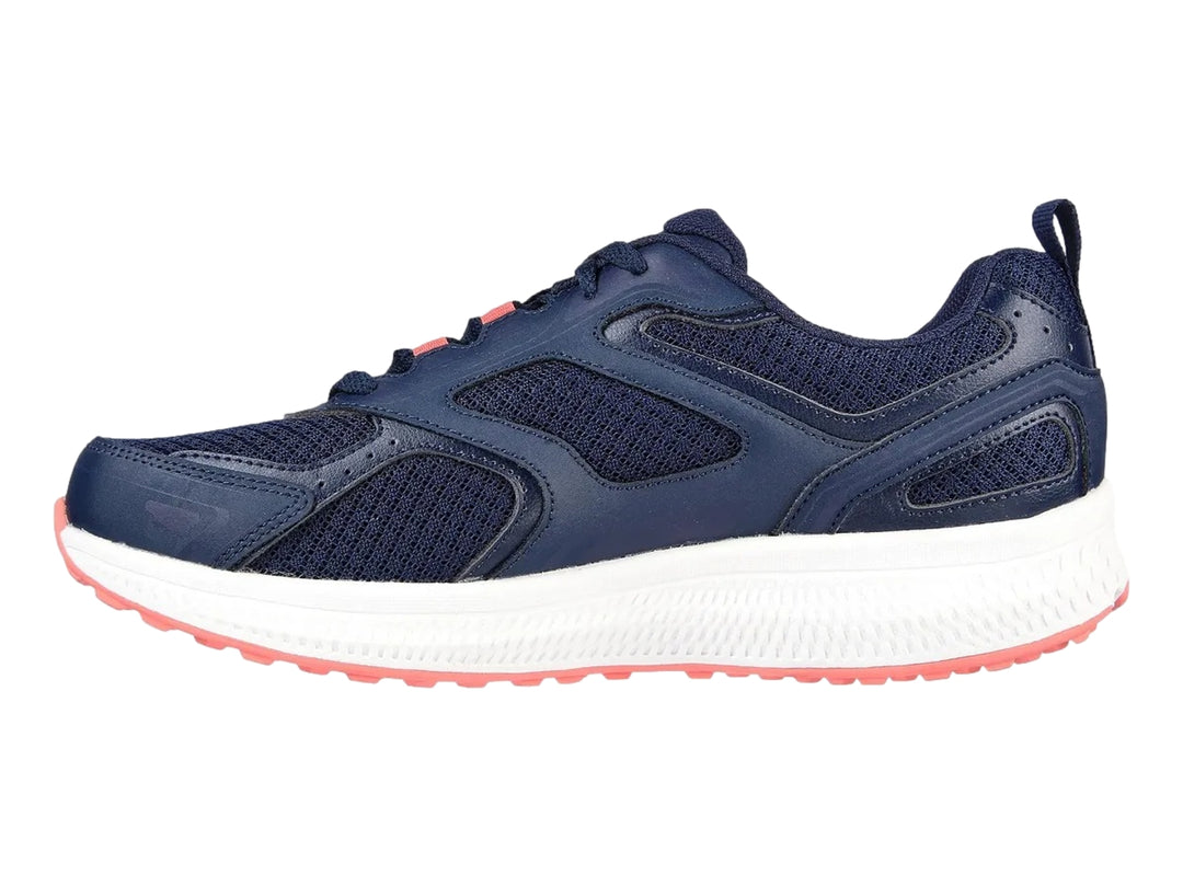Tenis deportivos Skechers color azul marino con suela blanca y detalles en rosa.