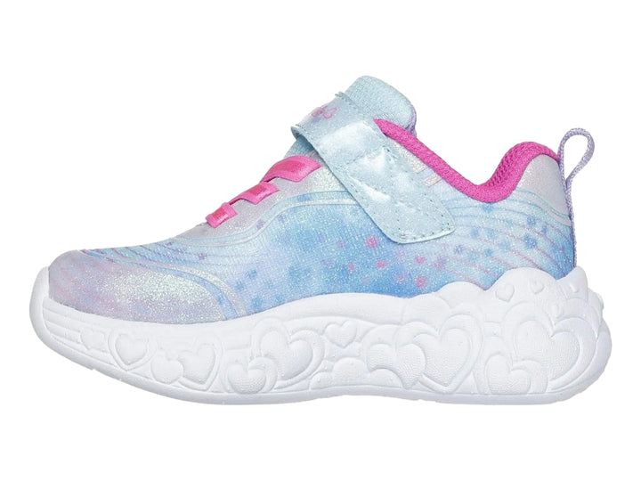 Tenis SKECHERS para niña color azul y rosa con suela de corazones iluminados y acabado brillante.