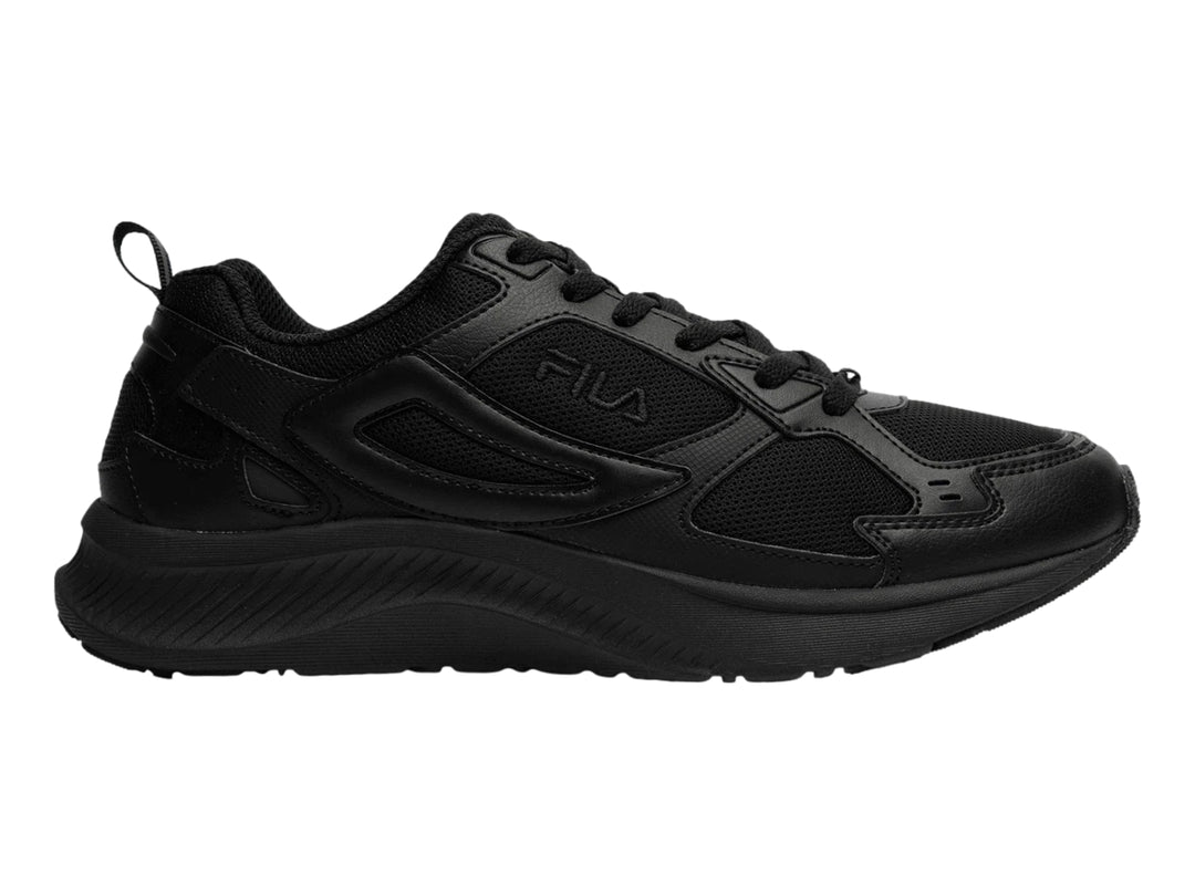 Tenis deportivos FILA color negro con suela gruesa y detalles en malla.