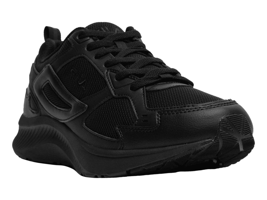 Tenis deportivos FILA color negro con suela gruesa y detalles en malla.