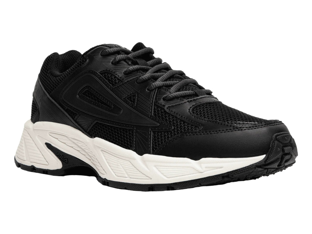 Tenis deportivos FILA color negro con suela blanca y detalles de malla.