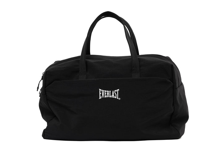 Maleta deportiva Everlast de color negro con logotipo blanco y asas superiores.