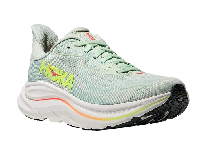 Tenis deportivos HOKA color verde menta con suela blanca y detalles en colores neón.