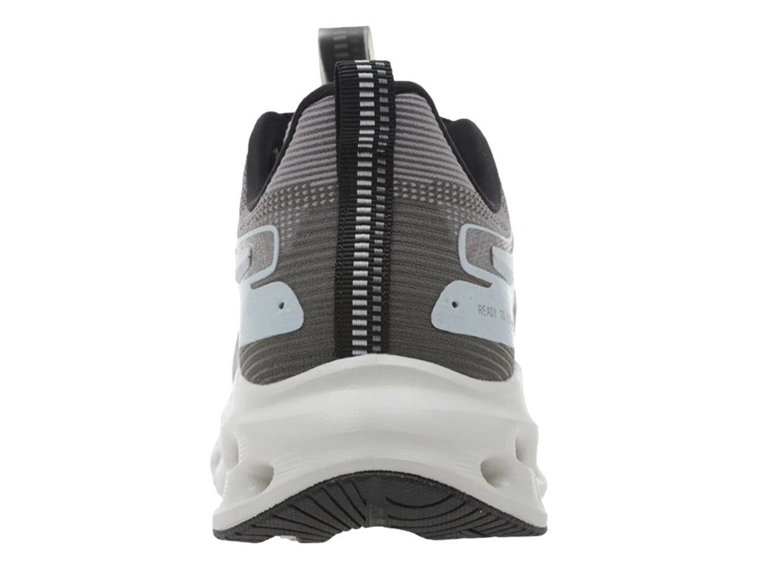 Tenis deportivos K-Swiss color gris con suela blanca perforada y detalles en negro.