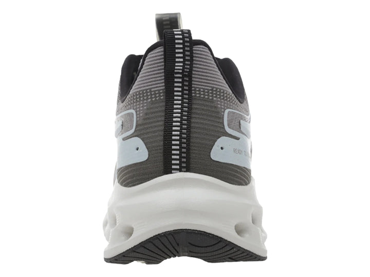 Tenis deportivos K-Swiss color gris con suela blanca perforada y detalles en negro.