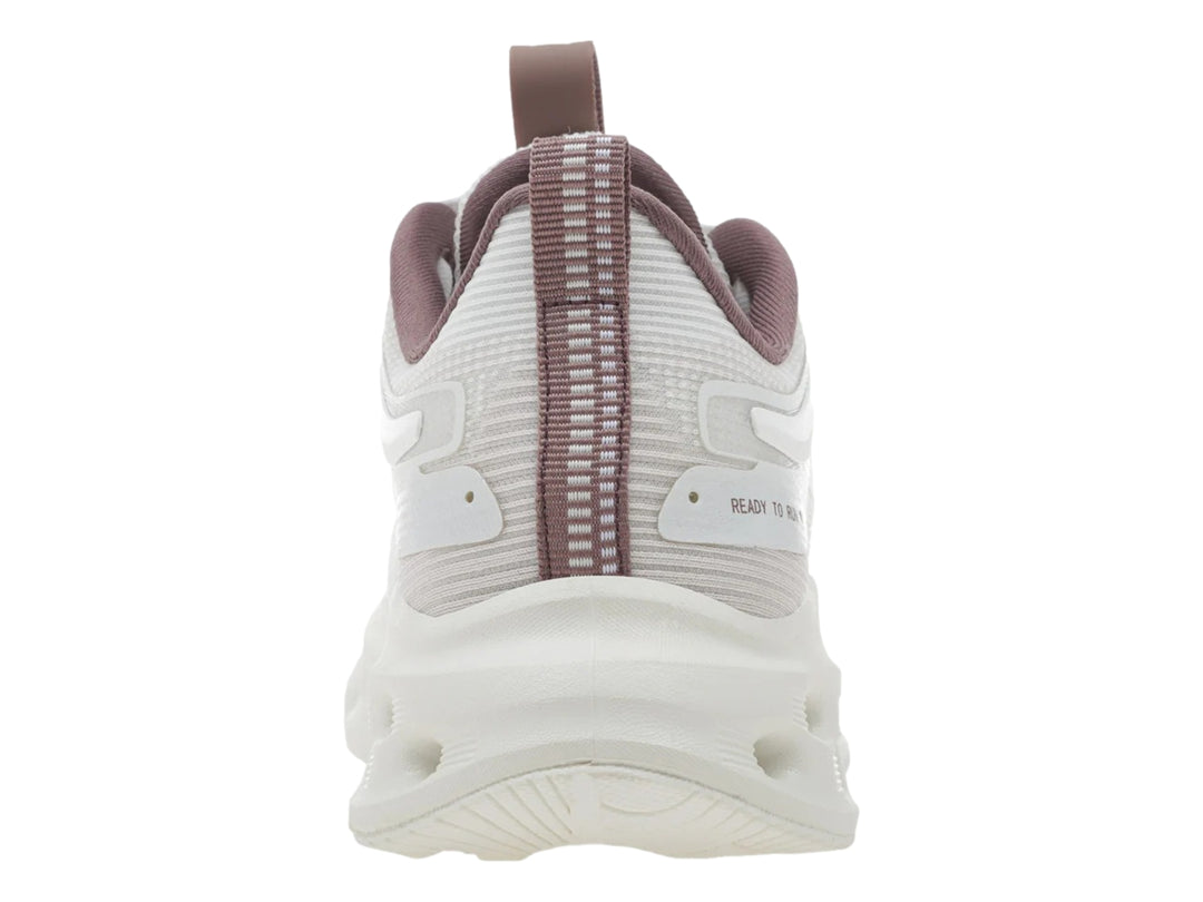 Tenis K-Swiss Atreux color blanco con detalles en morado para mujer.