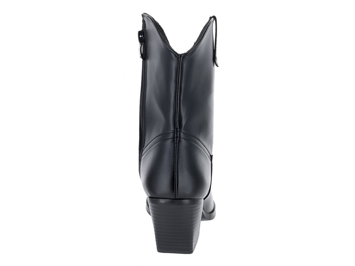 Botines vaqueros de color negro con tacón cuadrado y punta afilada sobre fondo blanco.