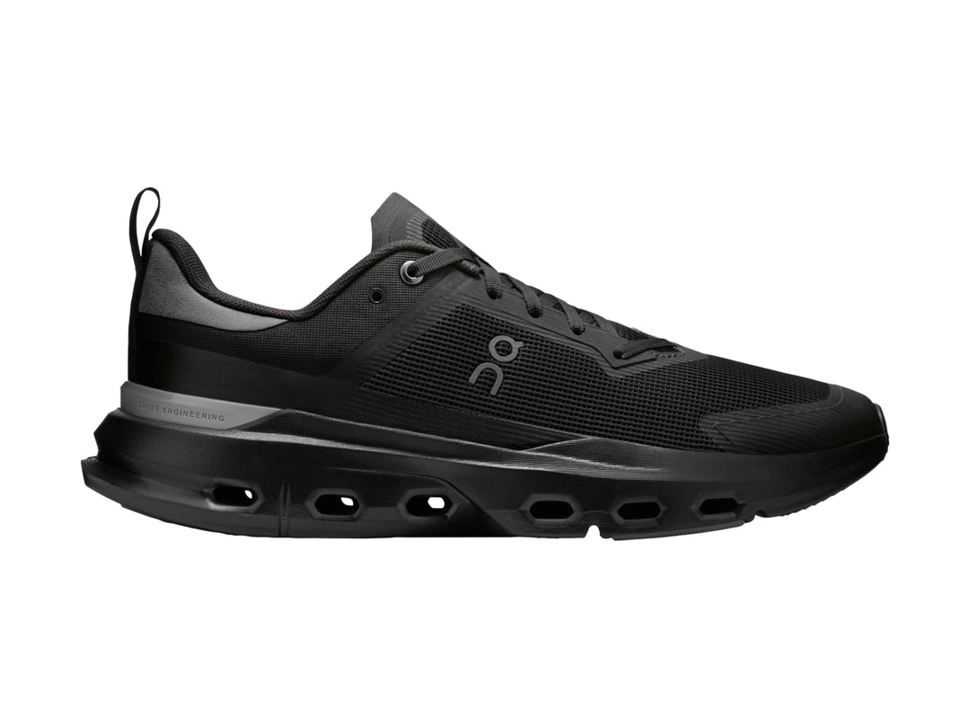 Tenis deportivos On Cloud en color negro con suela amortiguada y tejido transpirable.