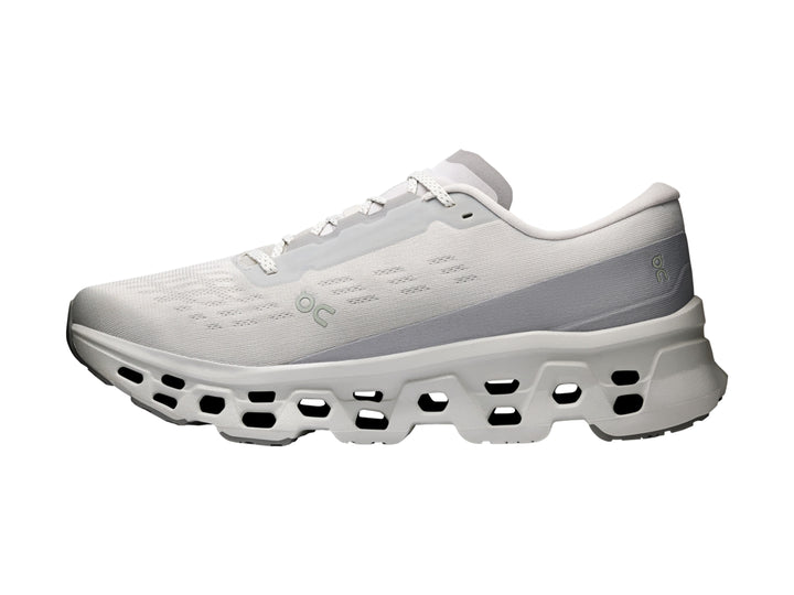 Tenis deportivos On Cloudmonster 3 en color gris claro con suela amortiguada característica.