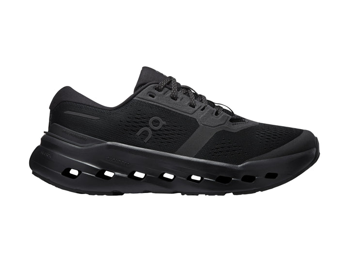Tenis deportivos On Cloud color negro con suela de celdas huecas y parte superior de malla.