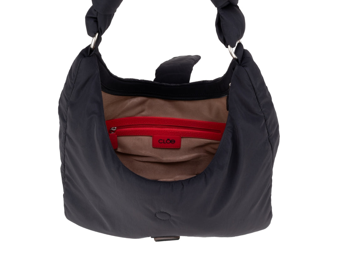 Bolso pequeño Cloe color negro con asa anudada y acabado mate.