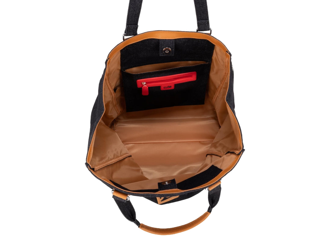 Bolsa tote color negro con detalles y asas en color naranja.