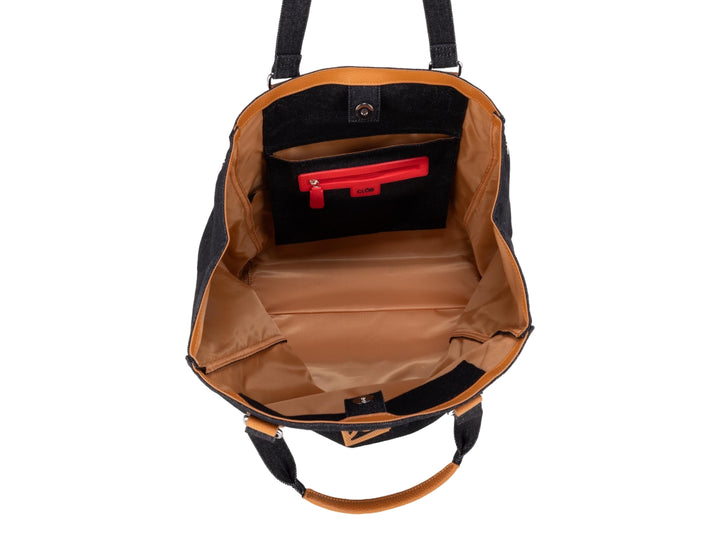 Bolsa tote color negro con detalles y asas en color naranja.