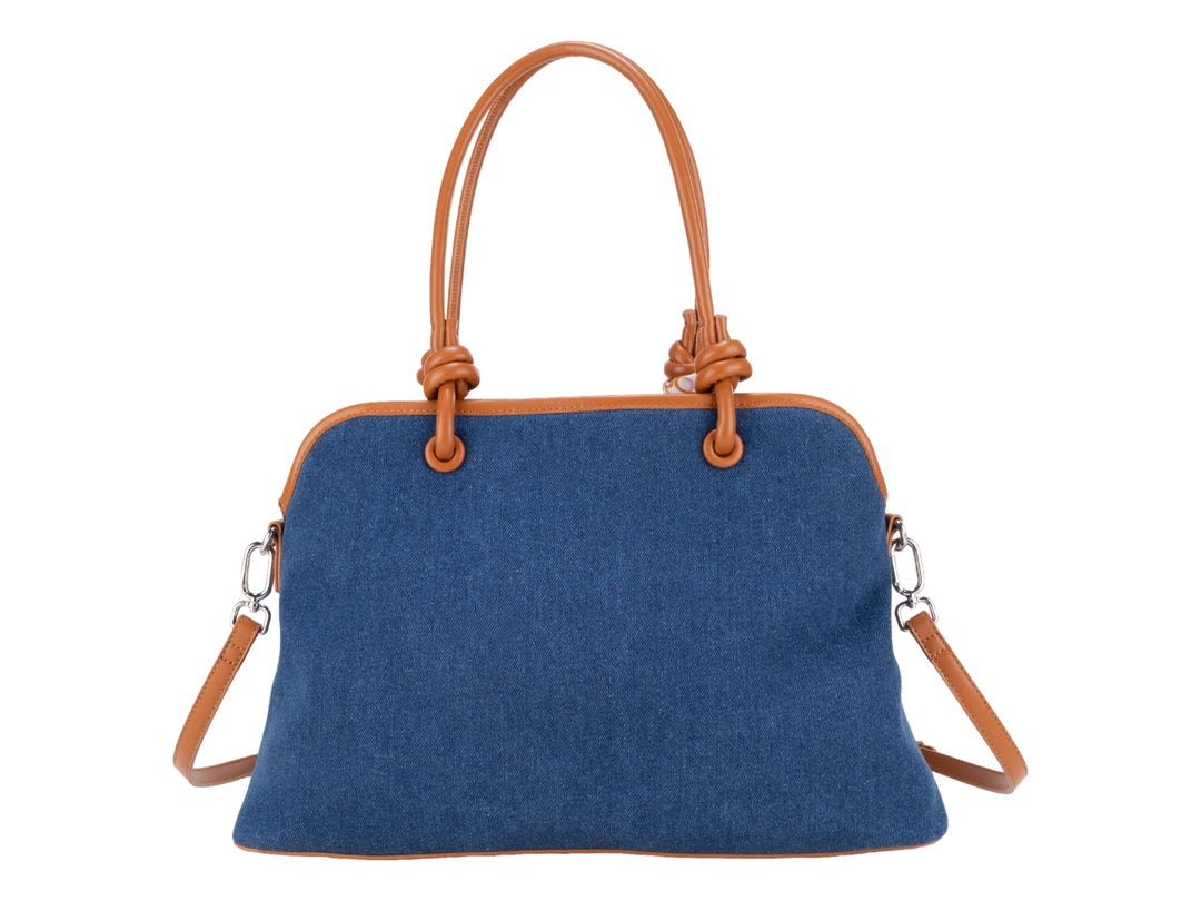 Bolsa Cloe azul con detalles en marrón y un pañuelo decorativo anudado en el asa.