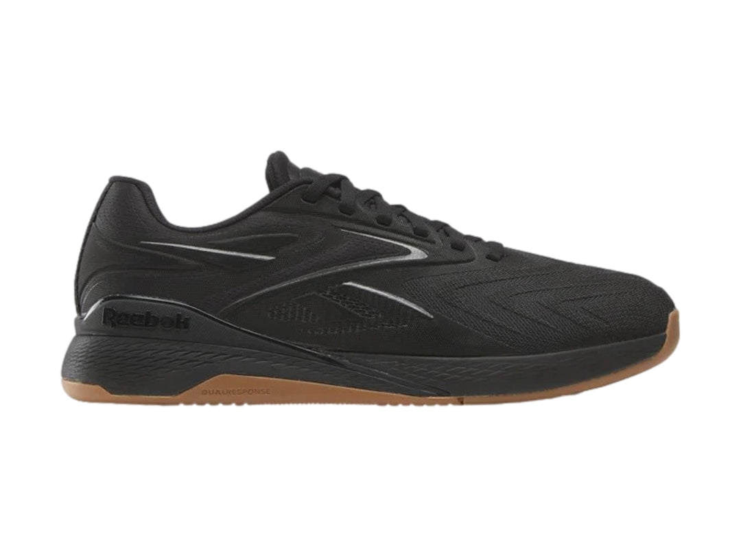 Tenis deportivos Reebok Nano X5 Edge color negro con suela café, vista lateral.
