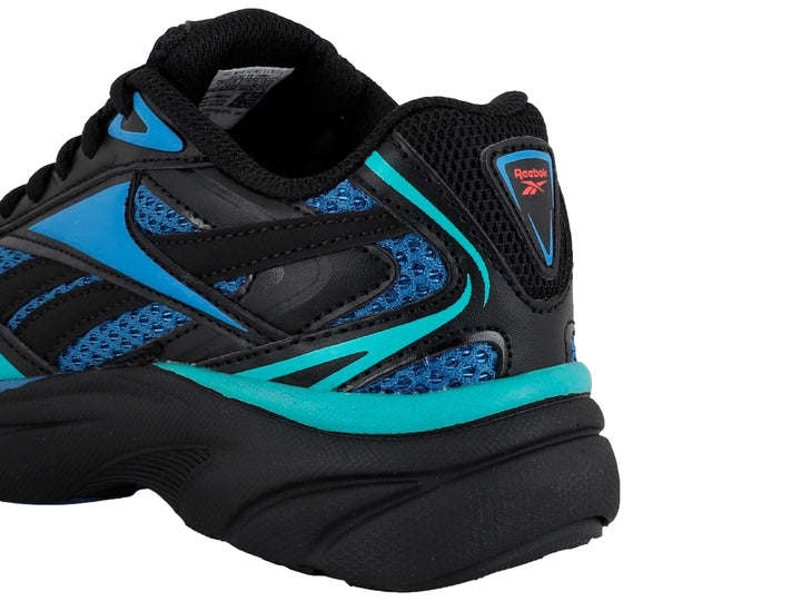 Tenis deportivos Reebok en color azul y negro con detalles en cian y suela negra.
