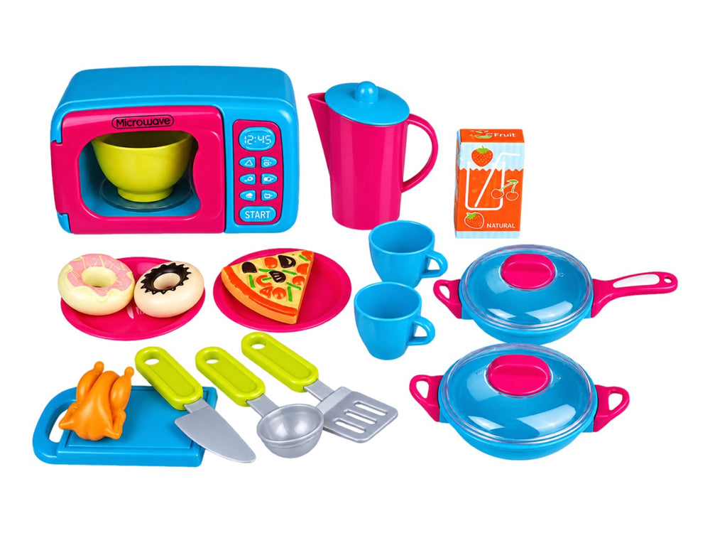 Set de cocina de juguete multicolor con microondas, utensilios y alimentos en empaque transparente.