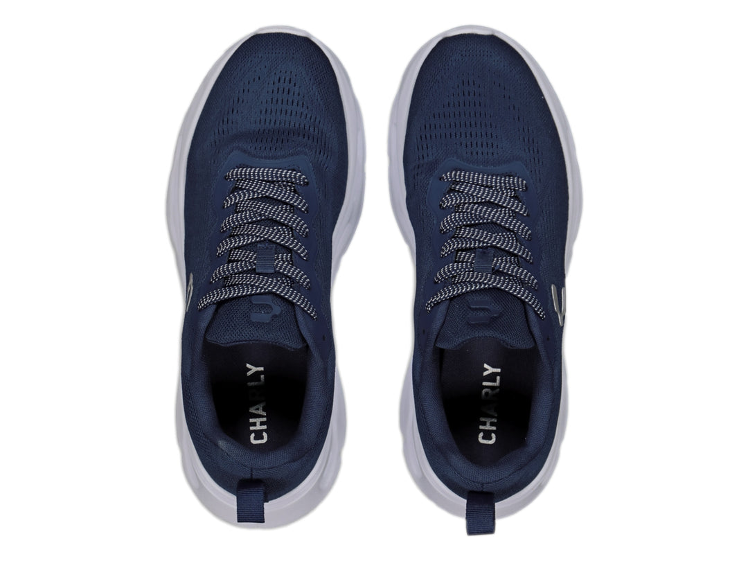 Tenis deportivos Charly color azul con suela blanca y tejido transpirable para hombre.