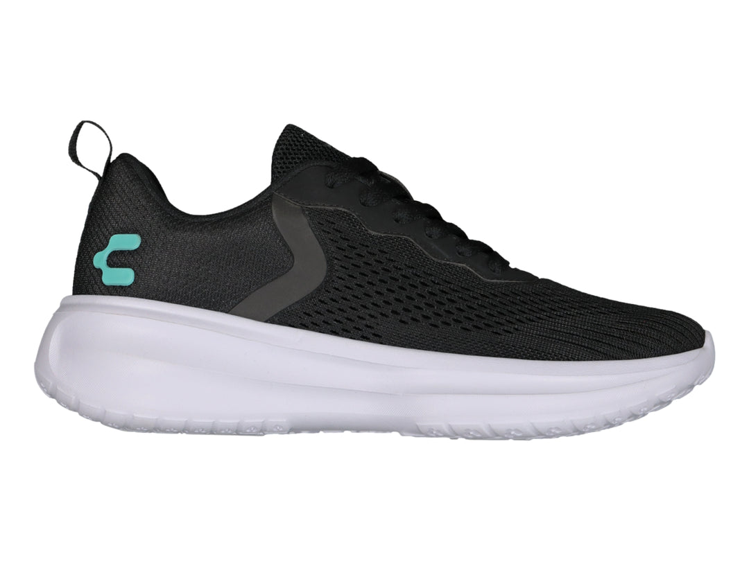 Tenis Charly Road Casual para mujer en color negro con suela blanca gruesa.