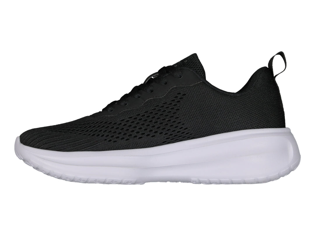 Tenis Charly Road Casual para mujer en color negro con suela blanca gruesa.