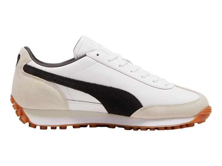 Tenis Puma Easy Rider Mix color blanco y negro con detalles en beige y suela color café.