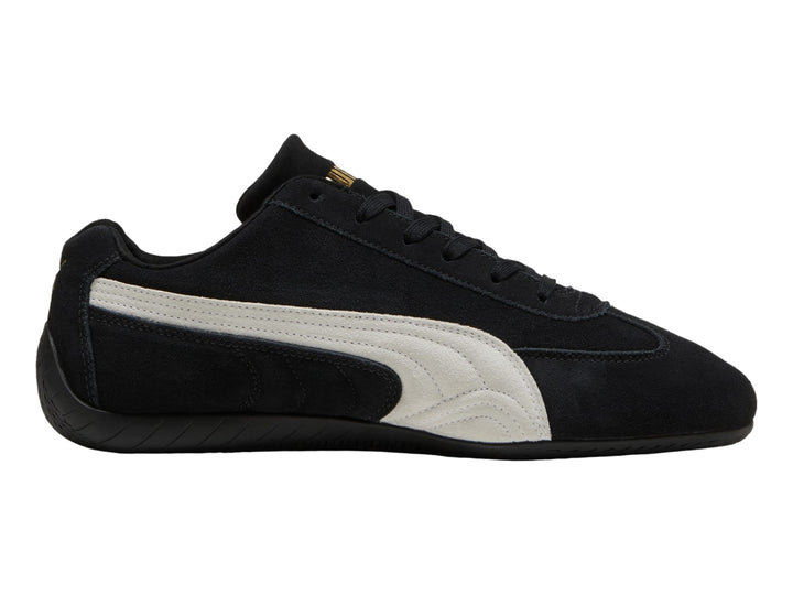 Tenis PUMA Speedcat OG color negro con franja lateral blanca y acabado en gamuza.