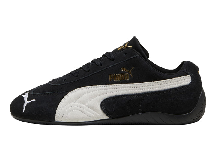 Tenis PUMA Speedcat OG color negro con franja lateral blanca y acabado en gamuza.