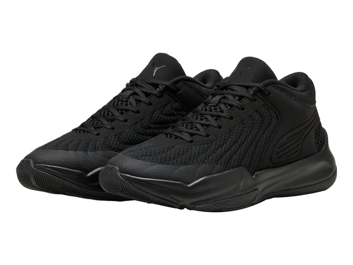 Tenis de baloncesto PUMA color negro para Niño, diseño deportivo con malla y suela robusta.