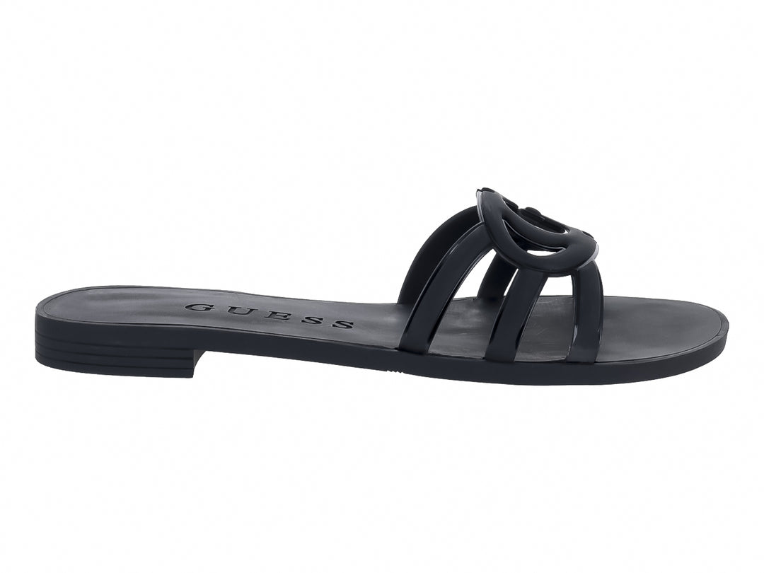 Sandalias planas color negro de la marca GUESS con tiras entrelazadas en la parte superior.
