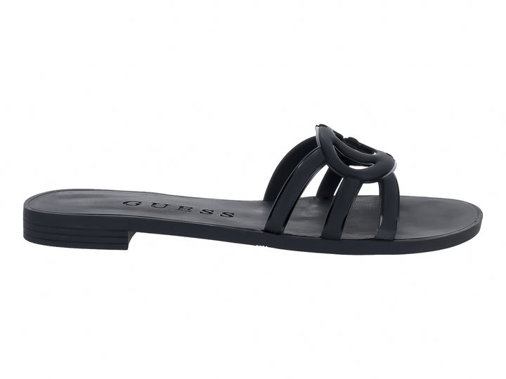 Sandalias planas color negro de la marca GUESS con tiras entrelazadas en la parte superior.