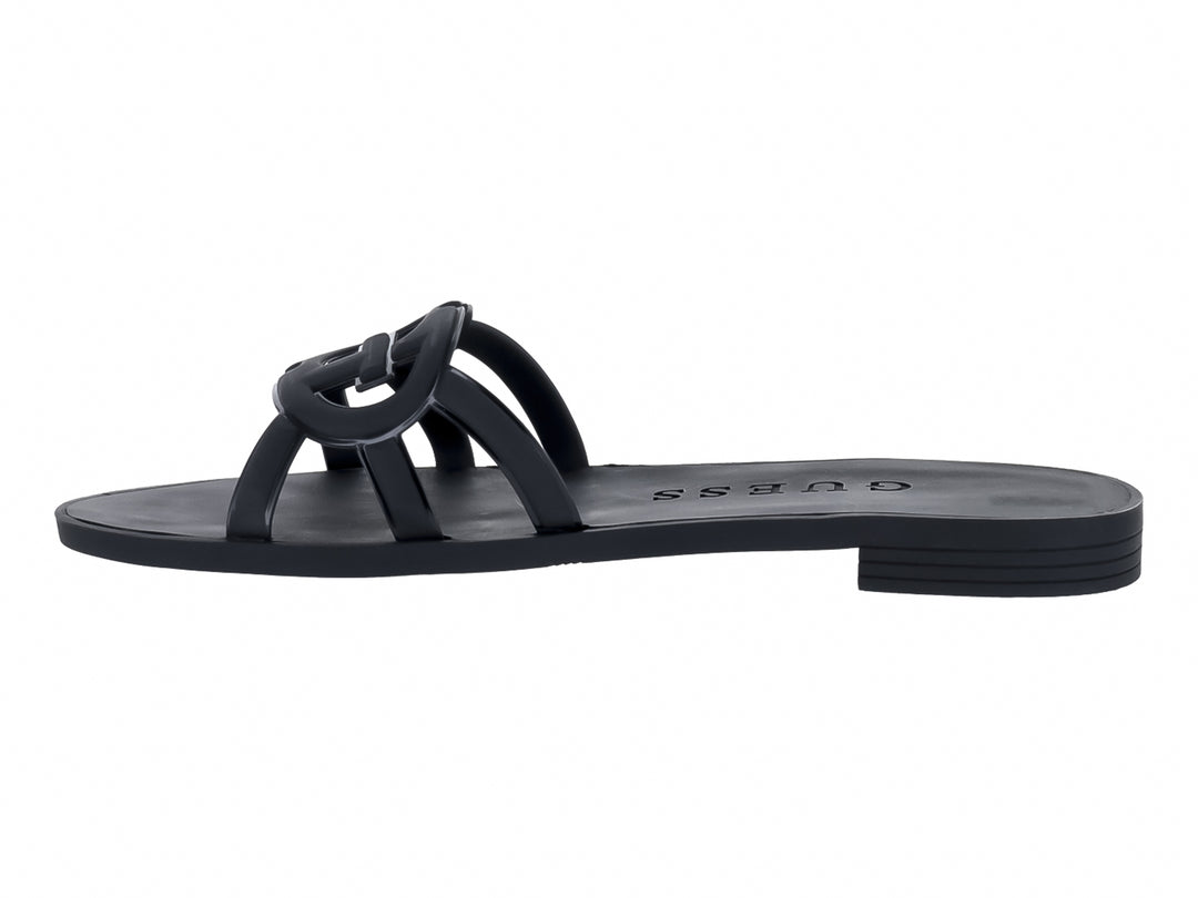 Sandalias planas color negro de la marca GUESS con tiras entrelazadas en la parte superior.