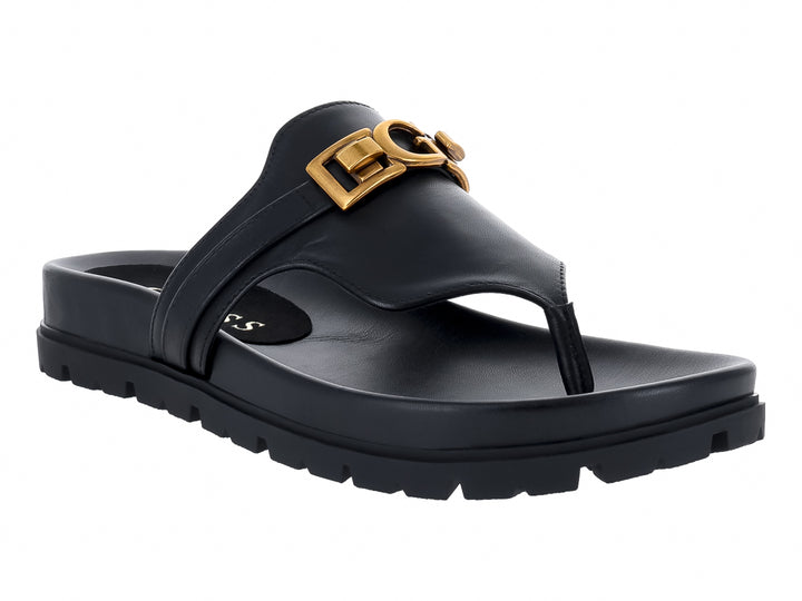 Sandalias negras de dedo GUESS con plataforma gruesa y hebilla dorada.