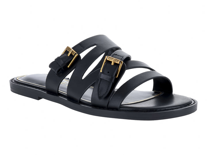 Sandalias planas negras con tiras y hebillas doradas de la marca GUESS.