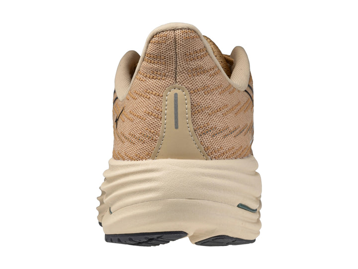 Tenis deportivos Mizuno Wave Rider 29 color beige con detalles en blanco y suela negra.