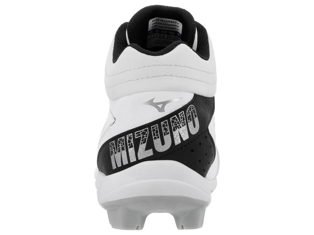 Zapato deportivo Mizuno blanco con detalles en negro y suela de tacos para beisbol.