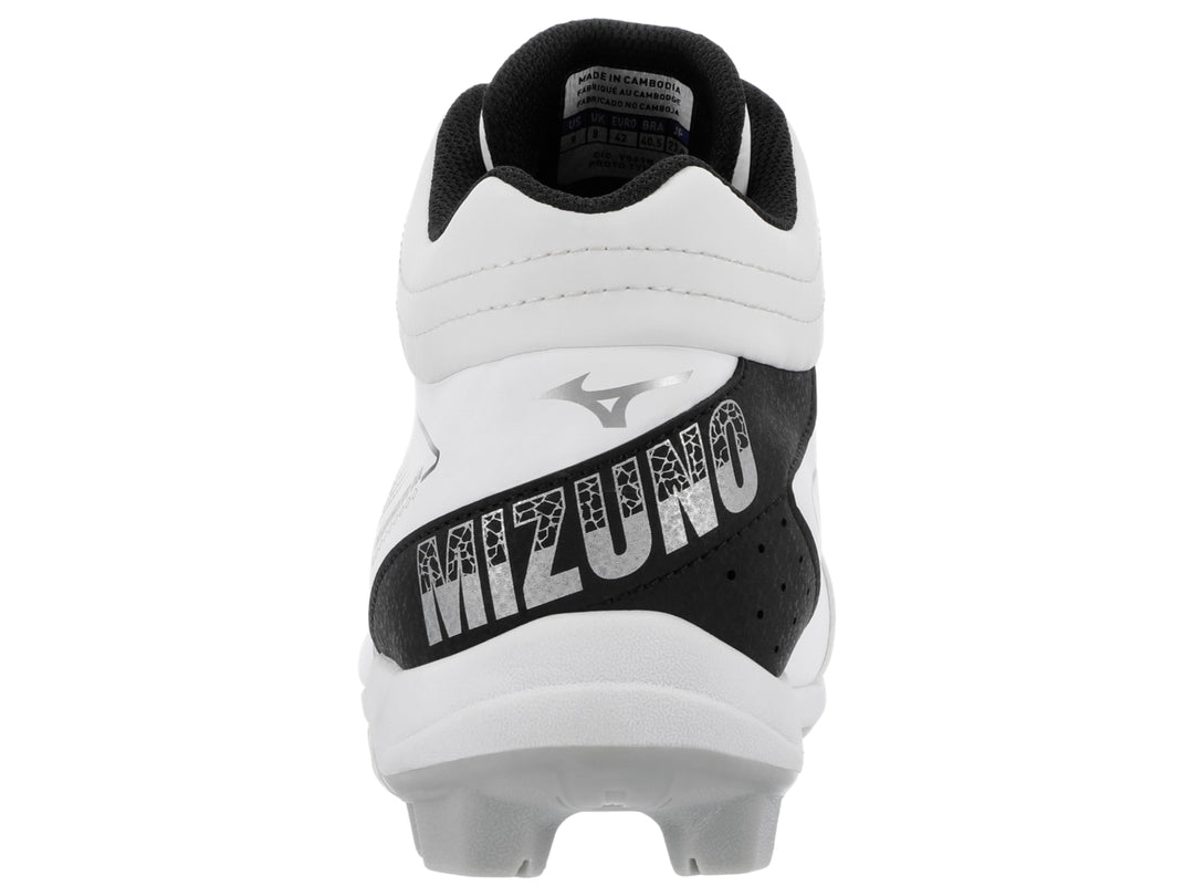Zapato deportivo Mizuno blanco con detalles en negro y suela de tacos para beisbol.
