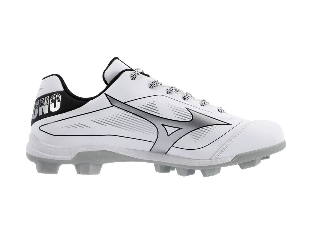Zapato deportivo Mizuno blanco con detalles negros y suela de tacos gris.