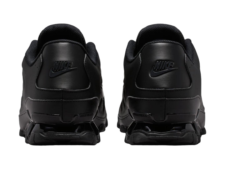Tenis Nike RAX 8 NSW SL color negro para hombre, vista lateral sobre fondo blanco.