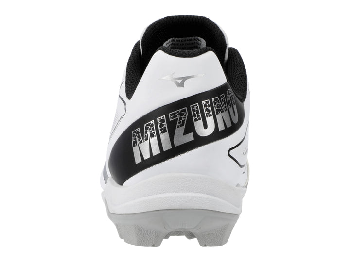 Zapato deportivo Mizuno blanco con detalles negros y suela de tacos.