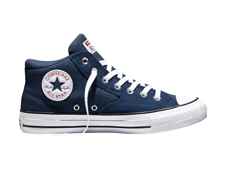 Tenis Converse azul marino con suela y agujetas blancas para hombre.