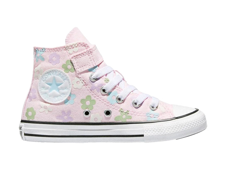 Tenis Converse rosa para niña con estampado de flores coloridas y suela blanca.