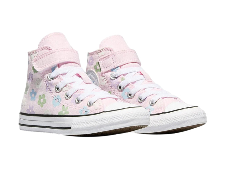 Tenis Converse rosa para niña con estampado de flores coloridas y suela blanca.