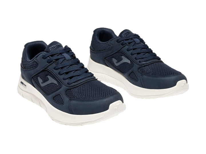 Tenis deportivos Joma Eros color marino con suela blanca para hombre.