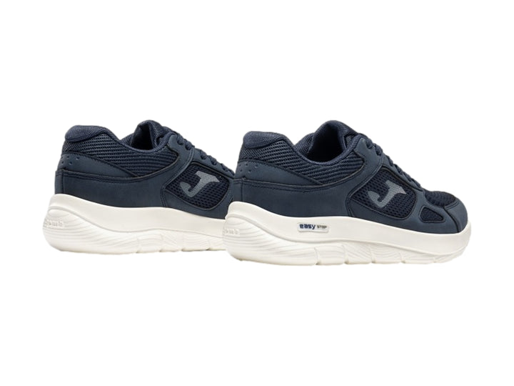 Tenis deportivos Joma Eros color marino con suela blanca para hombre.
