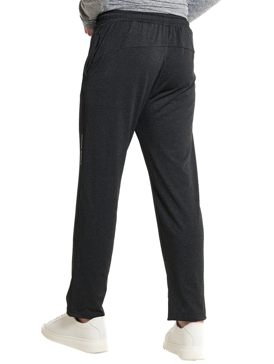 Pantalones deportivos Everlast color negro para entrenamiento con cintura ajustable y logo lateral.