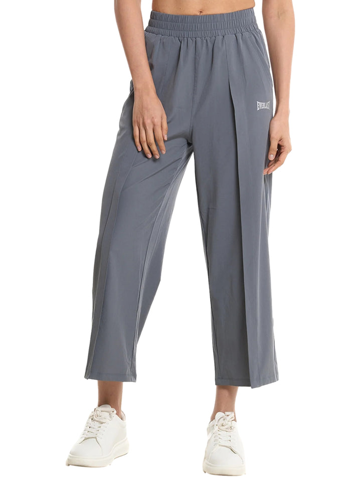 Pantalones deportivos Everlast color gris de pierna ancha y cintura elástica para entrenamiento.