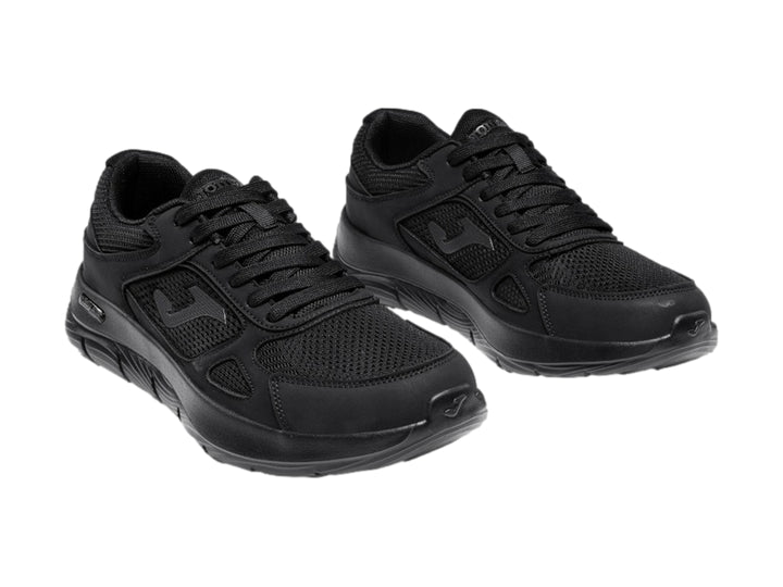 Tenis deportivos Joma Eros en color negro para hombre, vista lateral.